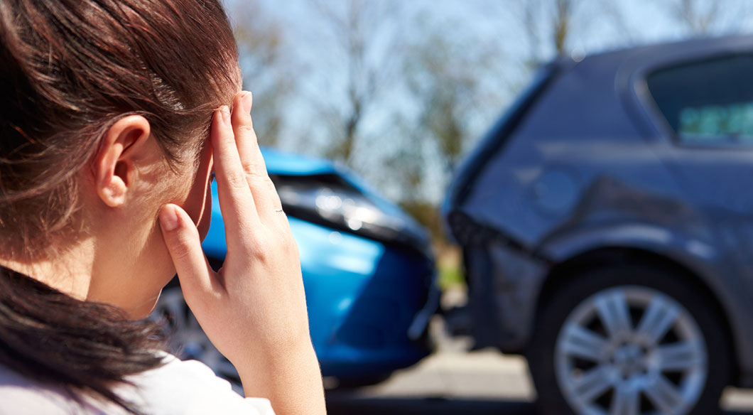 women with head pain after rear end car collision